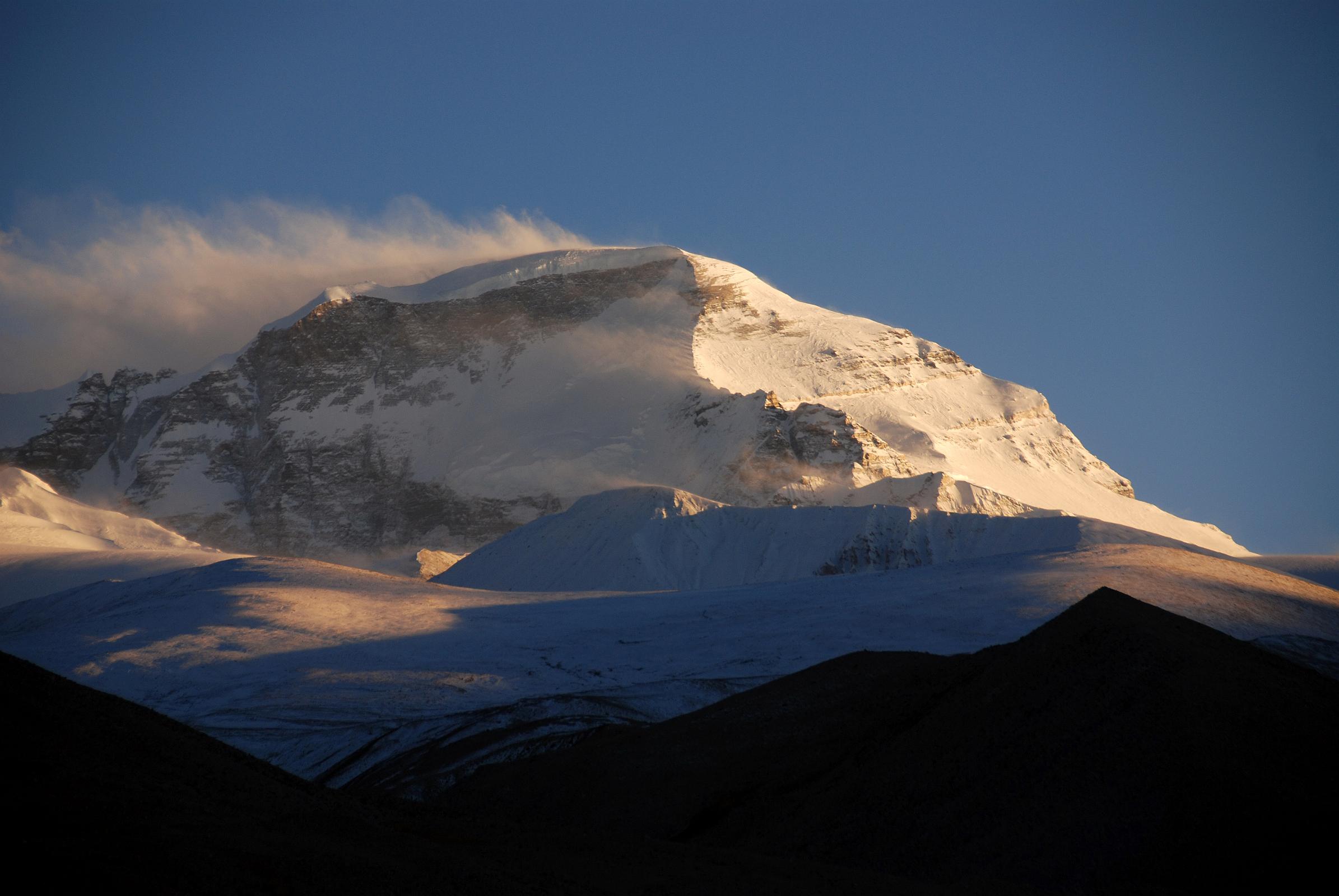 07 Cho Oyu Late Afternoon From Chinese Base Camp The light on Cho Oyu is starting to change from white to golden yellow just before the start of sunset from Chinese Base Camp.